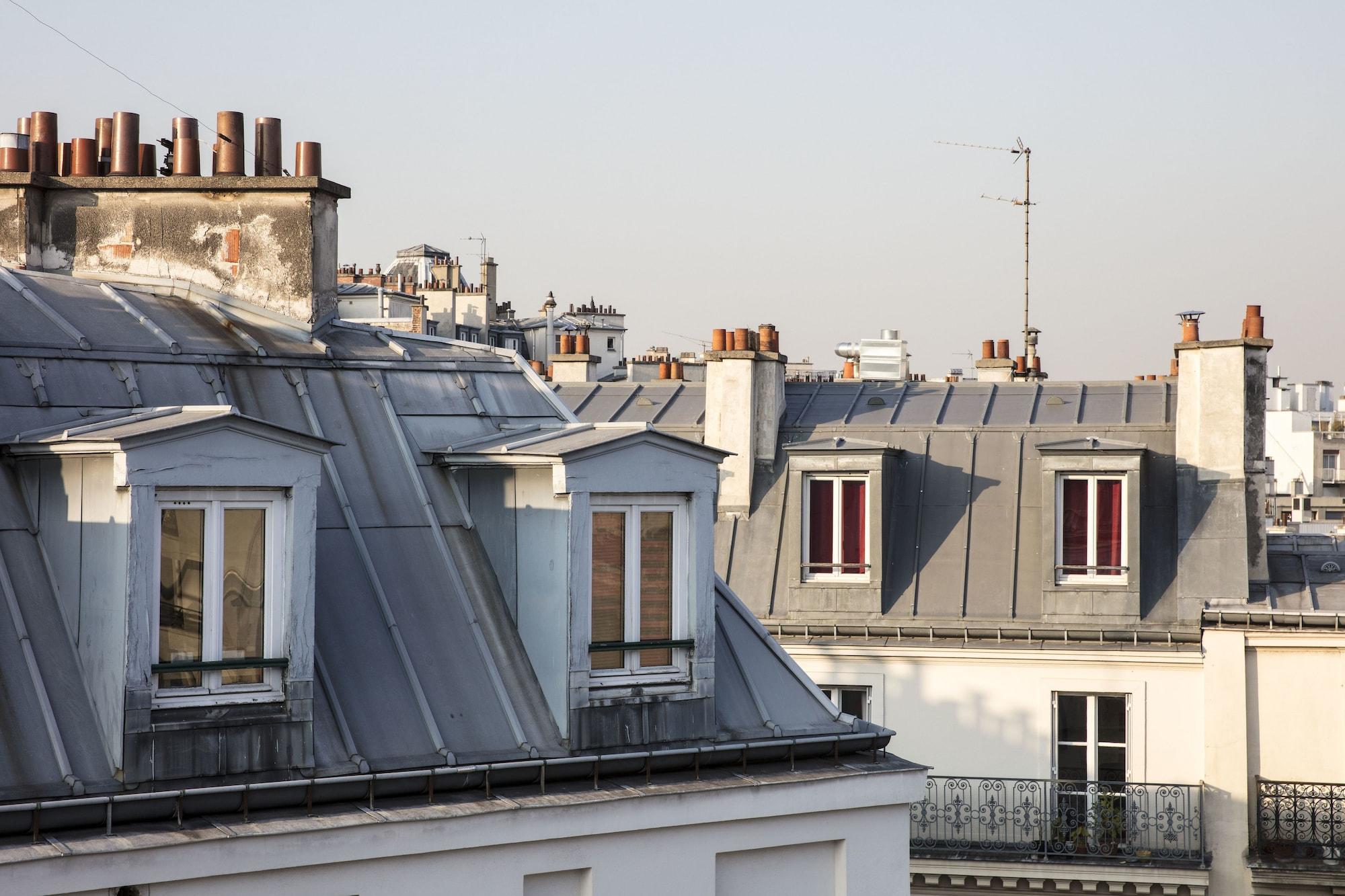 Maison Breguet Paris Bagian luar foto The roofs of Paris